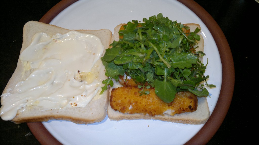 fishfinger sandwich with wild greens